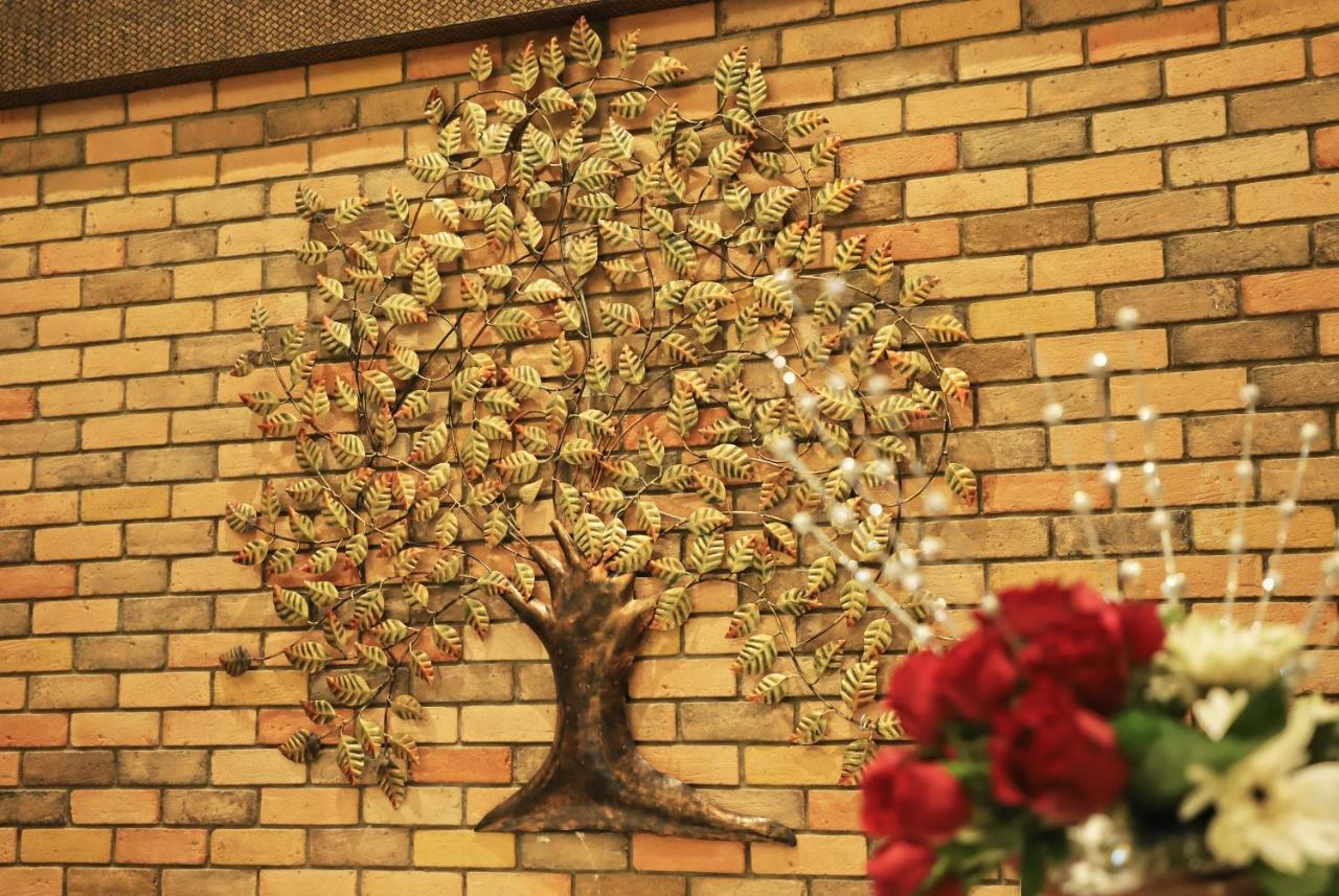 Sai Neem Tree Hotel เชอร์ดี ภายนอก รูปภาพ
